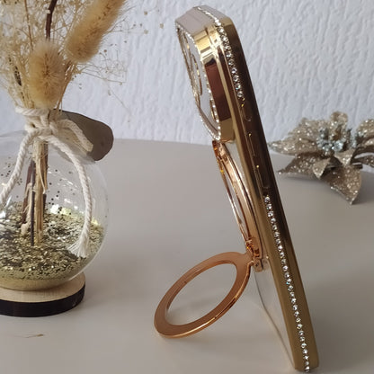 Coque iPhone 17 Pro Cristal Chic or One2K – présentation sur une table avec l'anneau support - photo lifestyle

